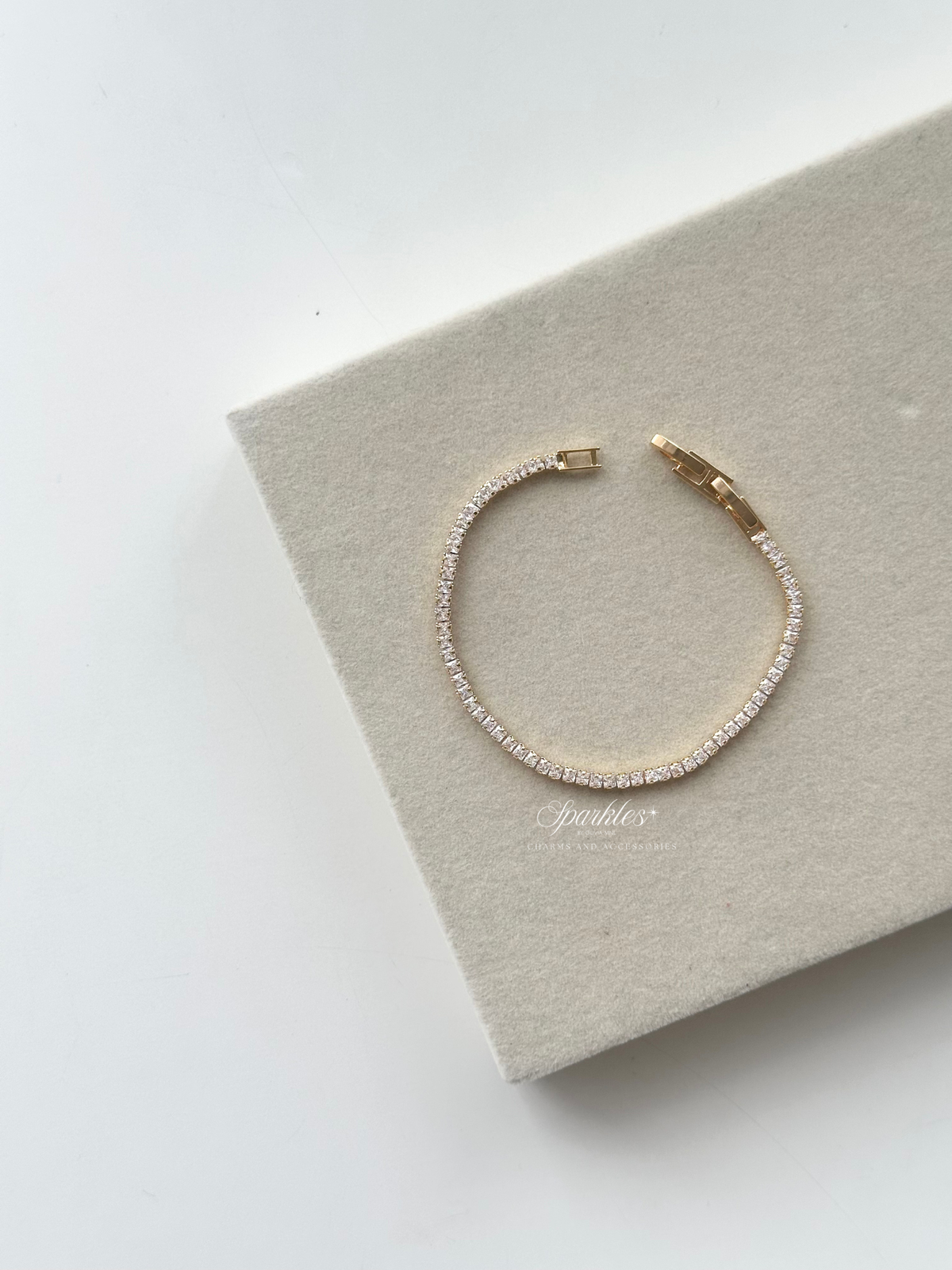 Cl5 Gold tennis bracelet