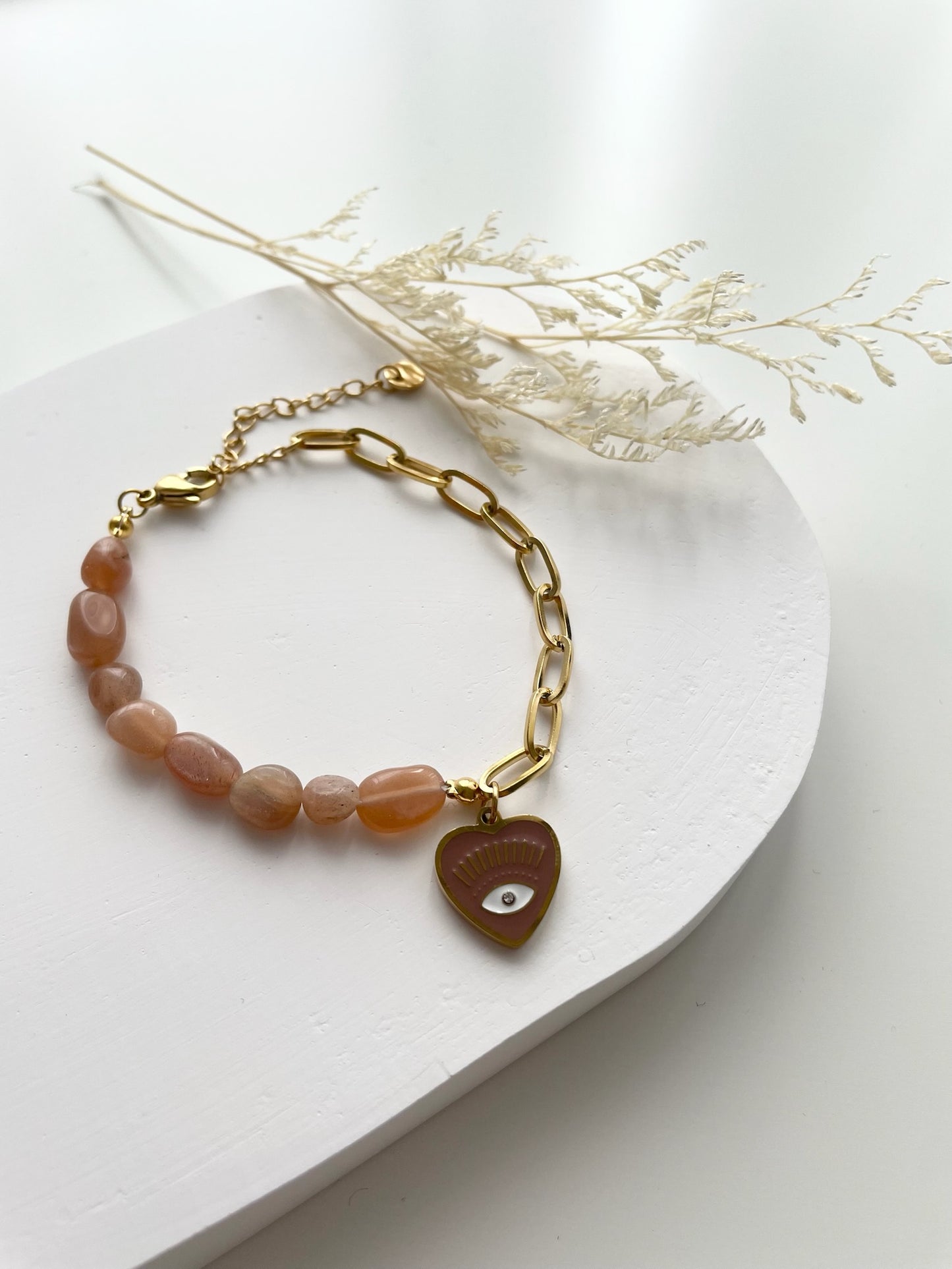 Peach evil eye with sunstone beads bracelet