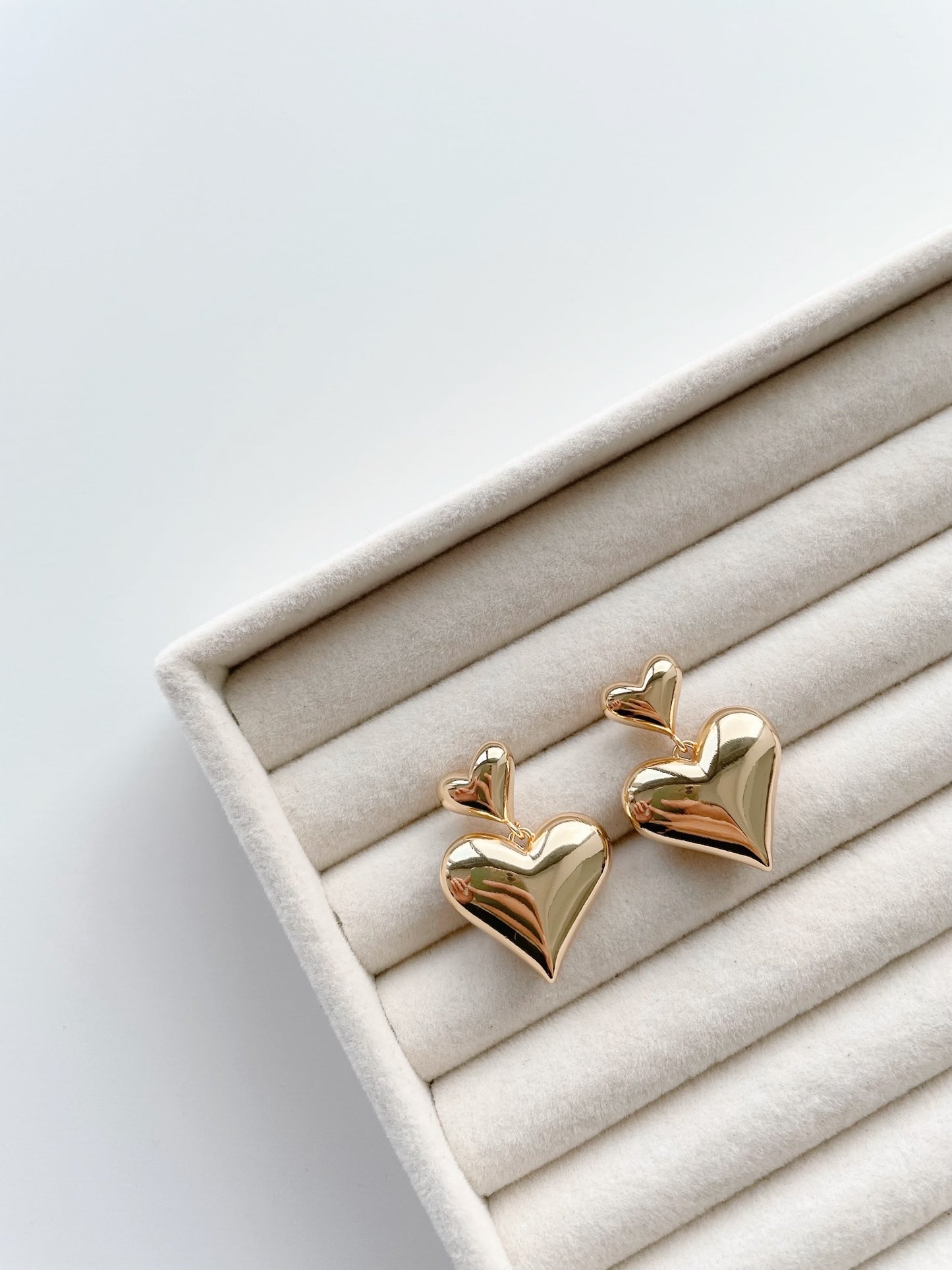 Dangling double heart earrings