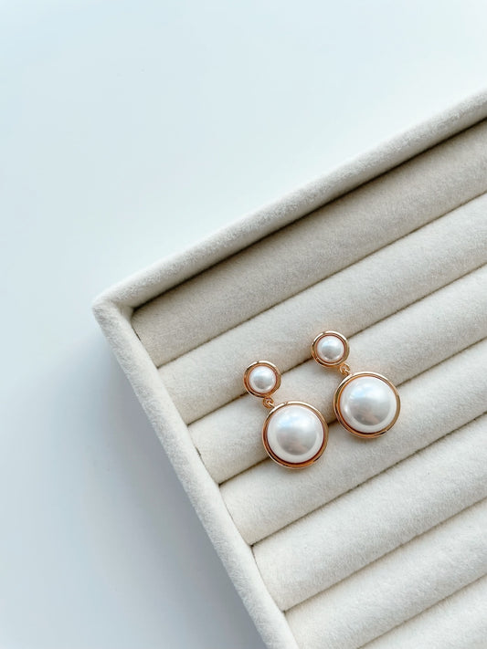 Double dangling pearl earrings