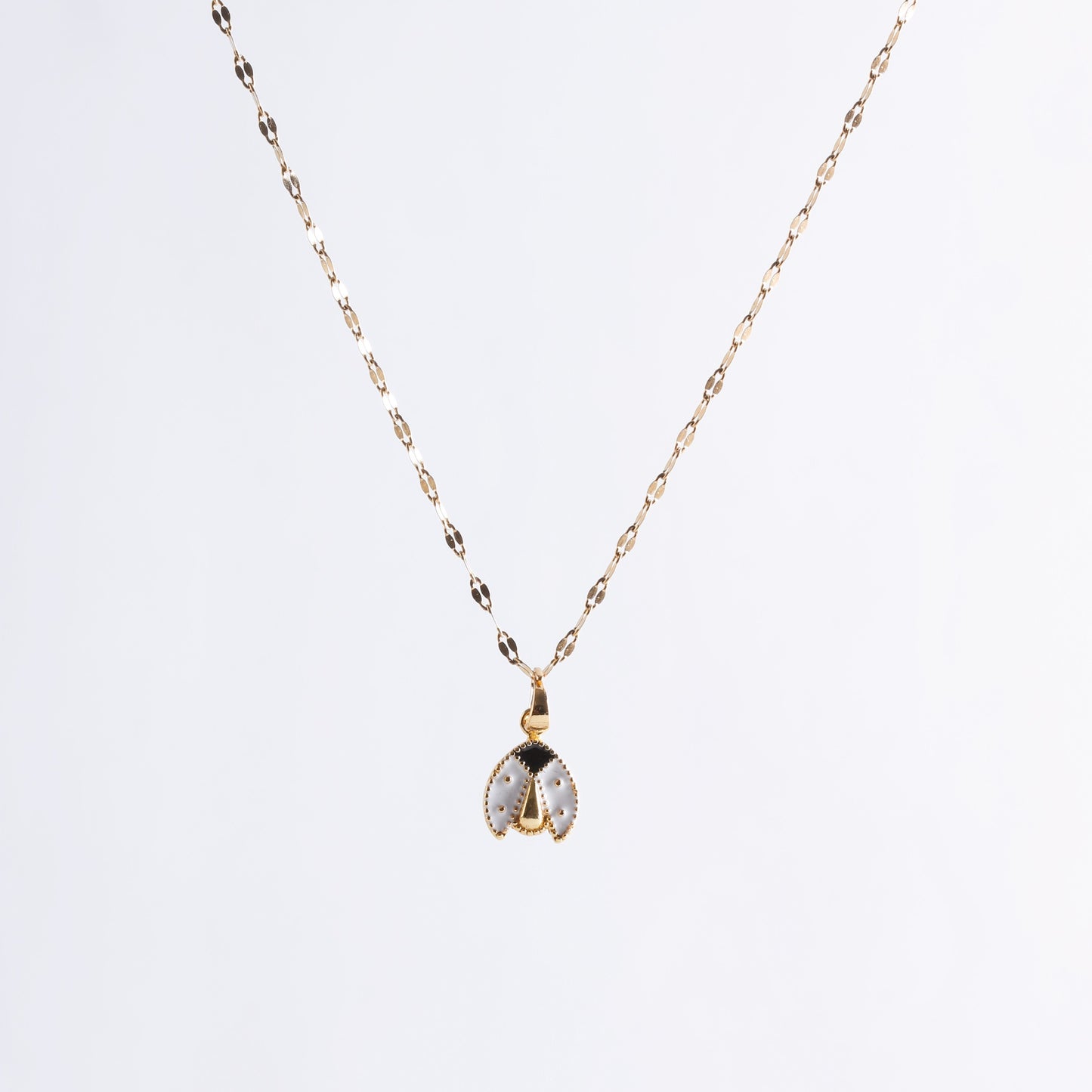 White Lady Bug Necklace In Gold