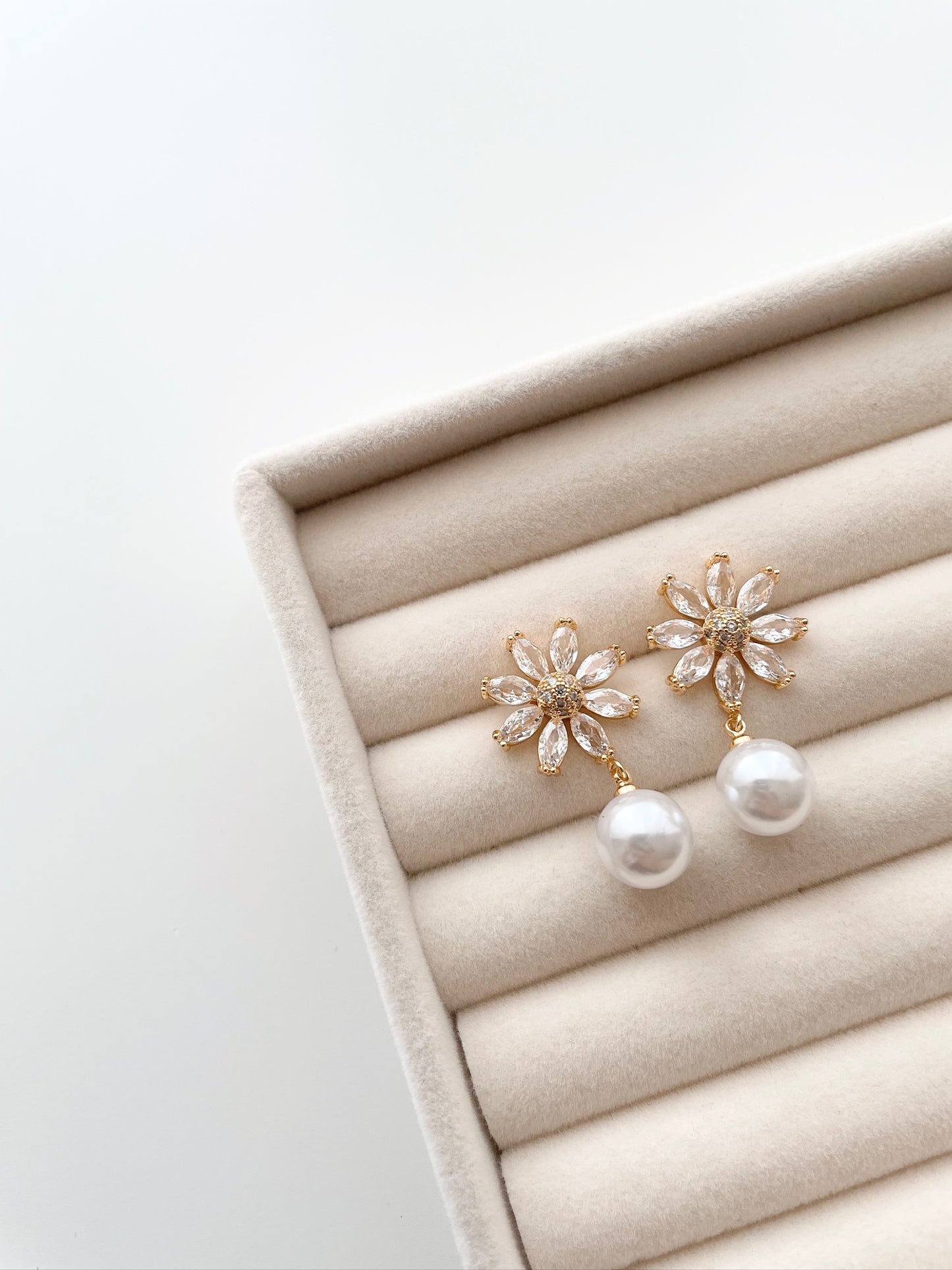 Aila Flower stone and dangling pearl earrings