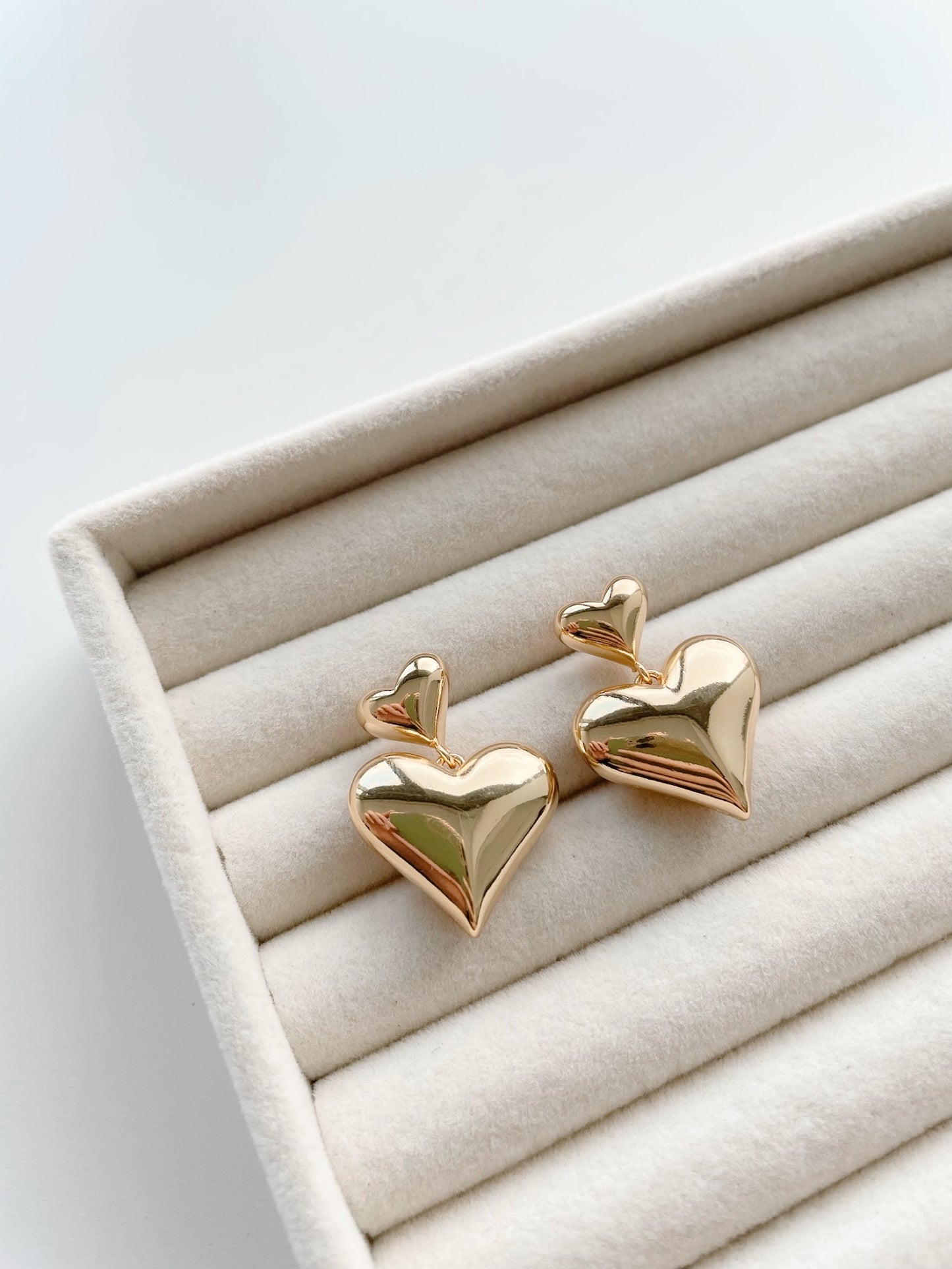 Dangling double heart earrings