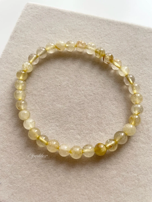 sel6 Gold Rutilated Quartz with sizes