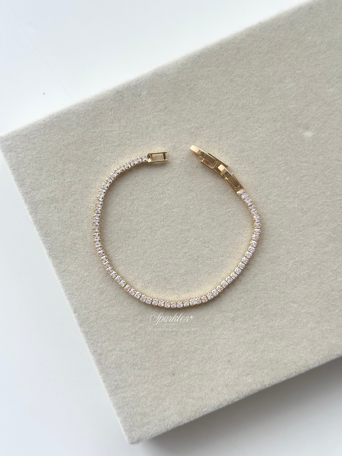 Cl5 Gold tennis bracelet