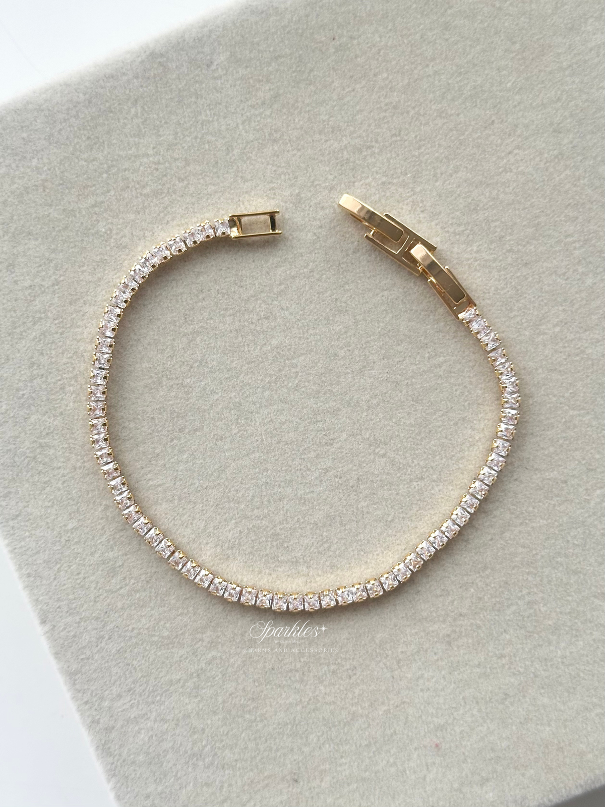 Cl5 Gold tennis bracelet